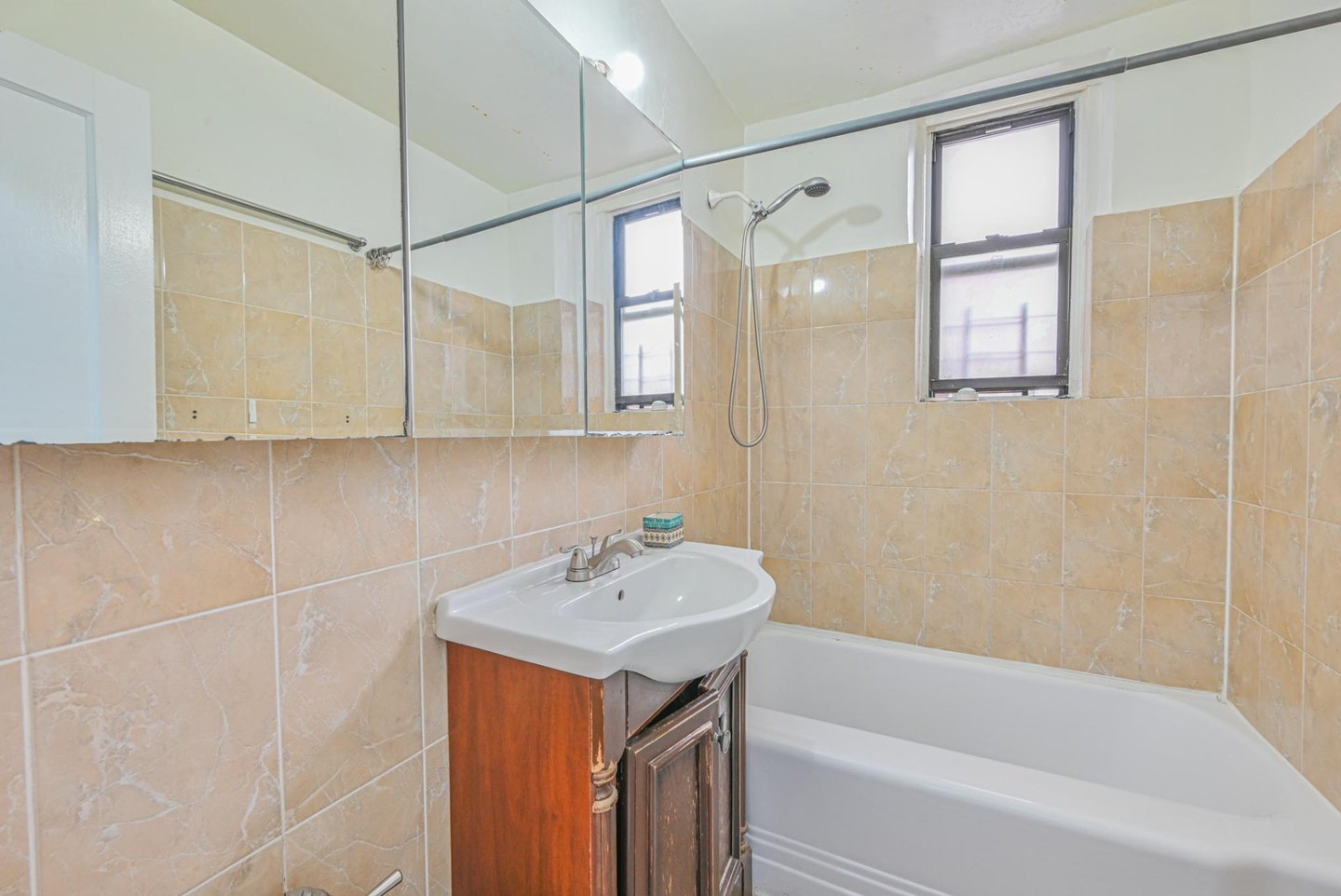 Jackson Heights co-op bathroom before the vanity and fixture updates