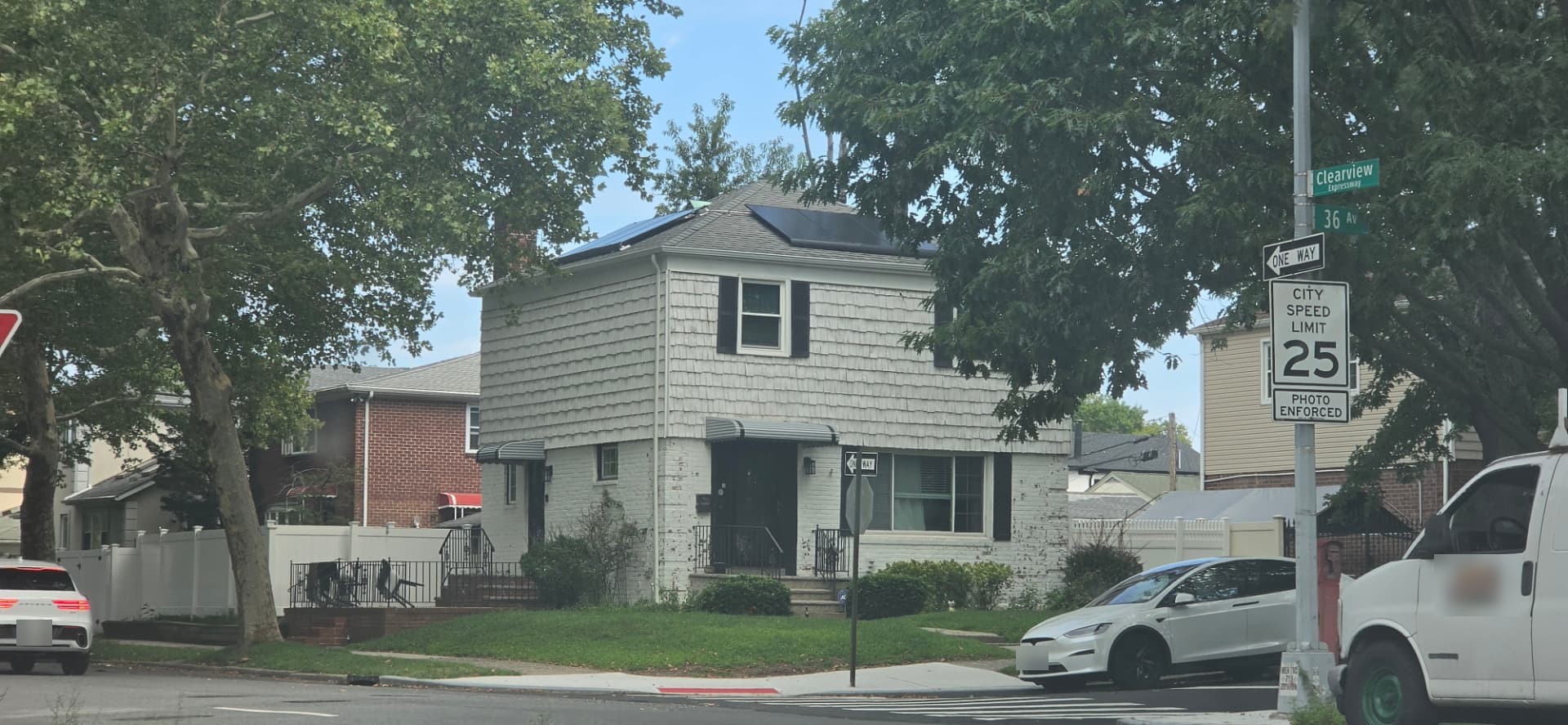 White colonial home at 207-03 36th Avenue in Bayside, a completed transaction represented by Andrew Ragusa
