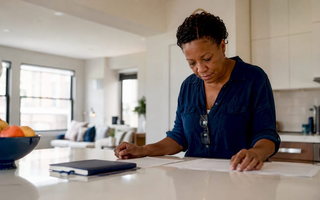 Woman reviewing real estate settlement papers